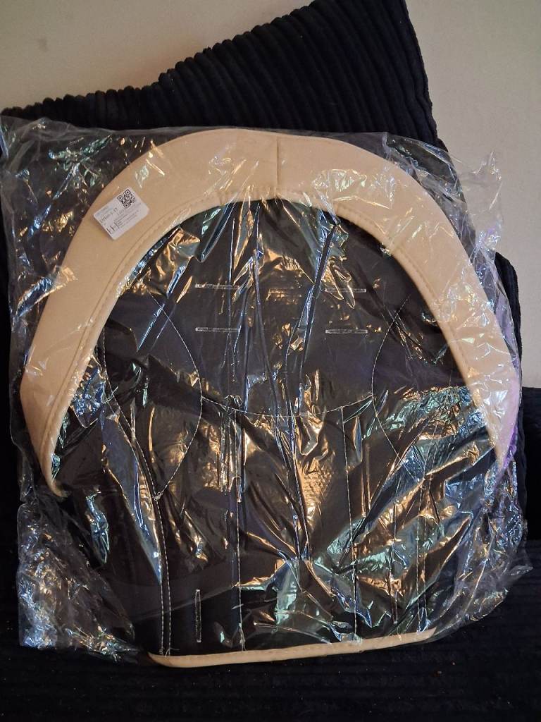 Seat cover new in pkt