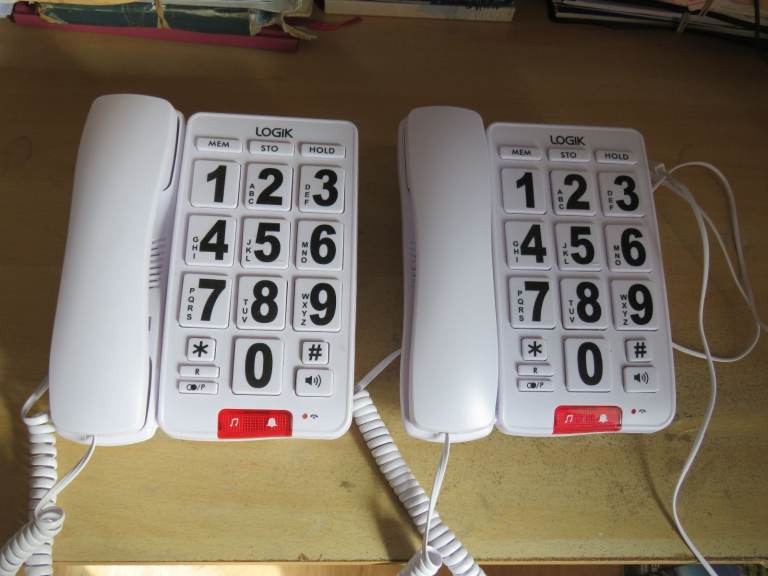 Two Logik big button telephones
