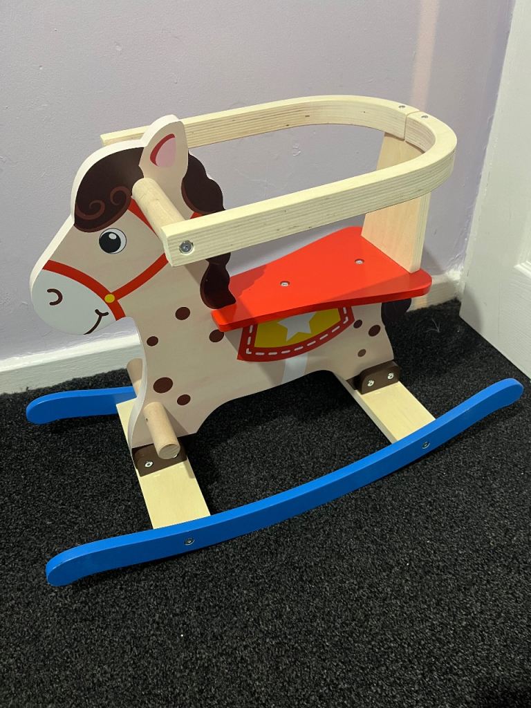 image for Wooden rocking horse toy for sale (like new)