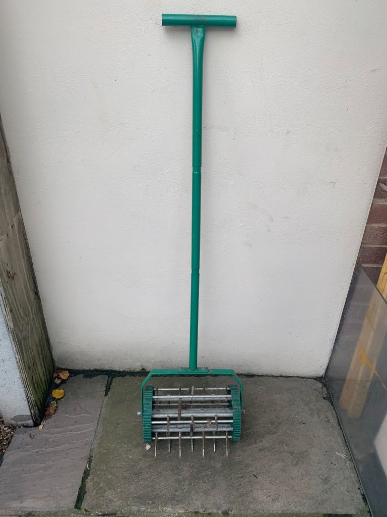 Lawn aerator roller