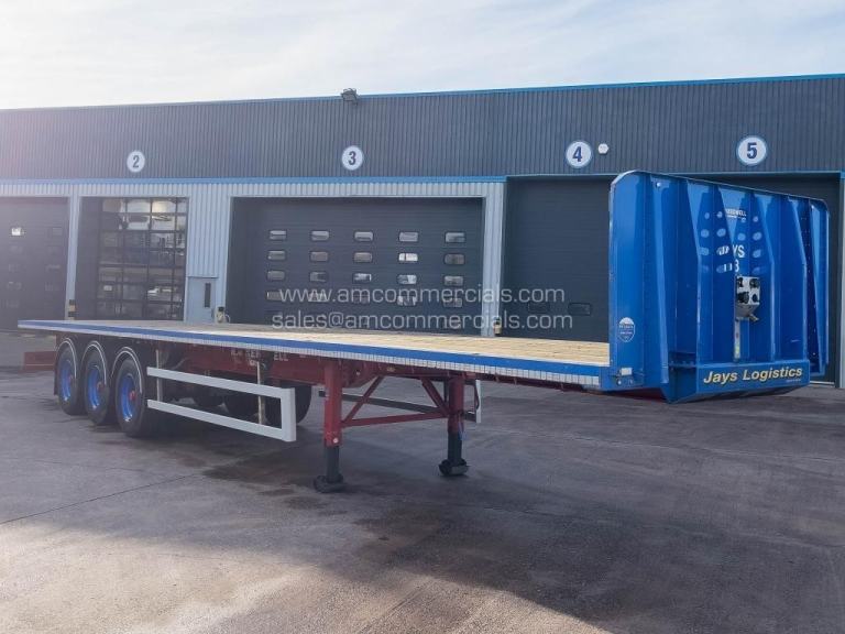 SDC FLAT BED TRI AXLE TRAILER