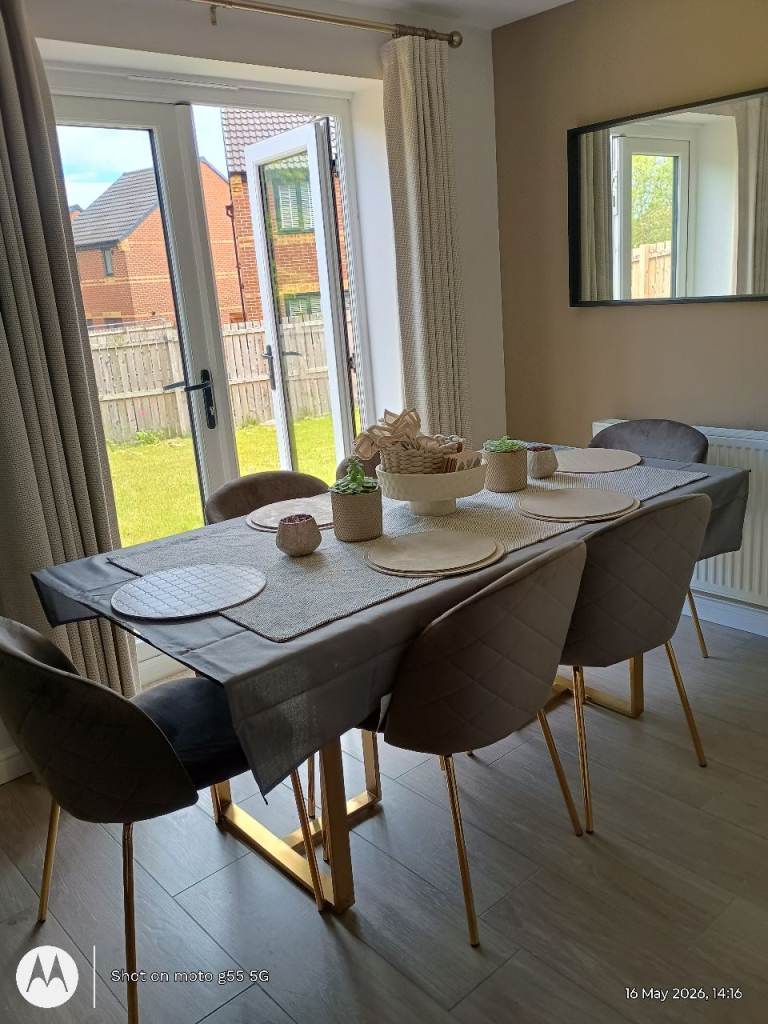 Brand new show home gold, grey glass table and chairs 