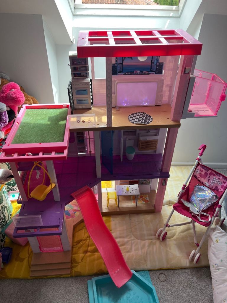 Large Pink Doll House with Accessories – Good Condition