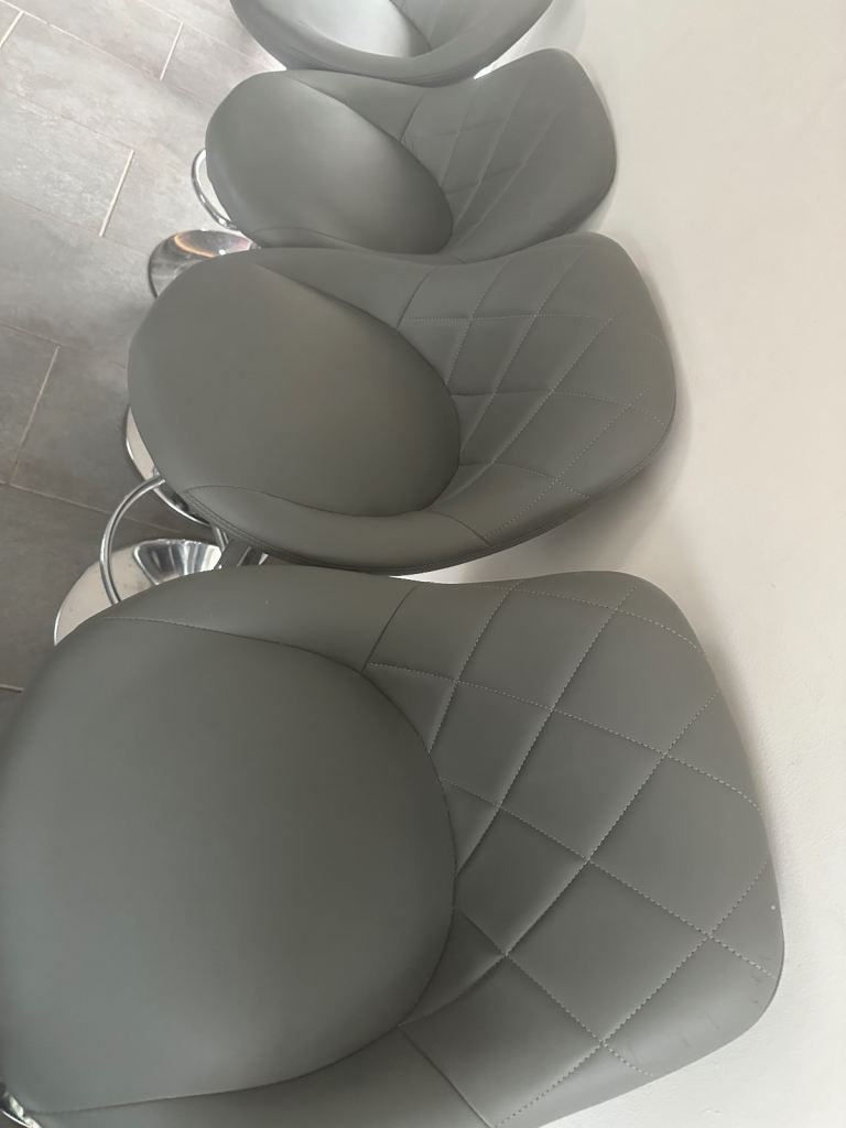 Set of 4 used grey leather kitchen bar stools