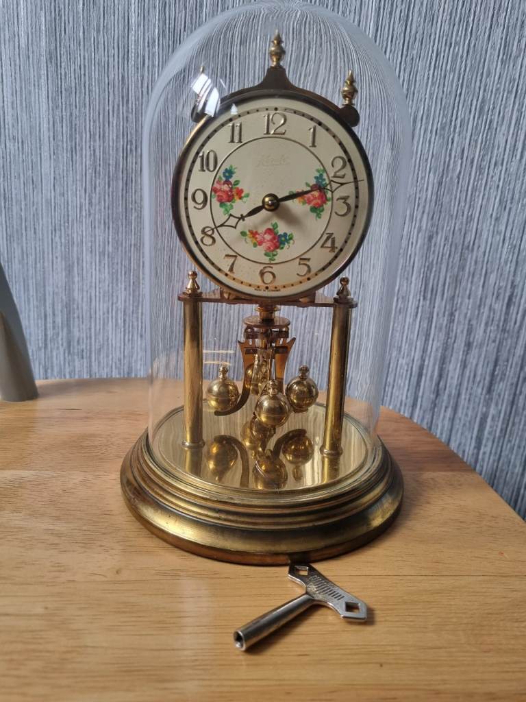 Vintage kundo anniversary clock with key 