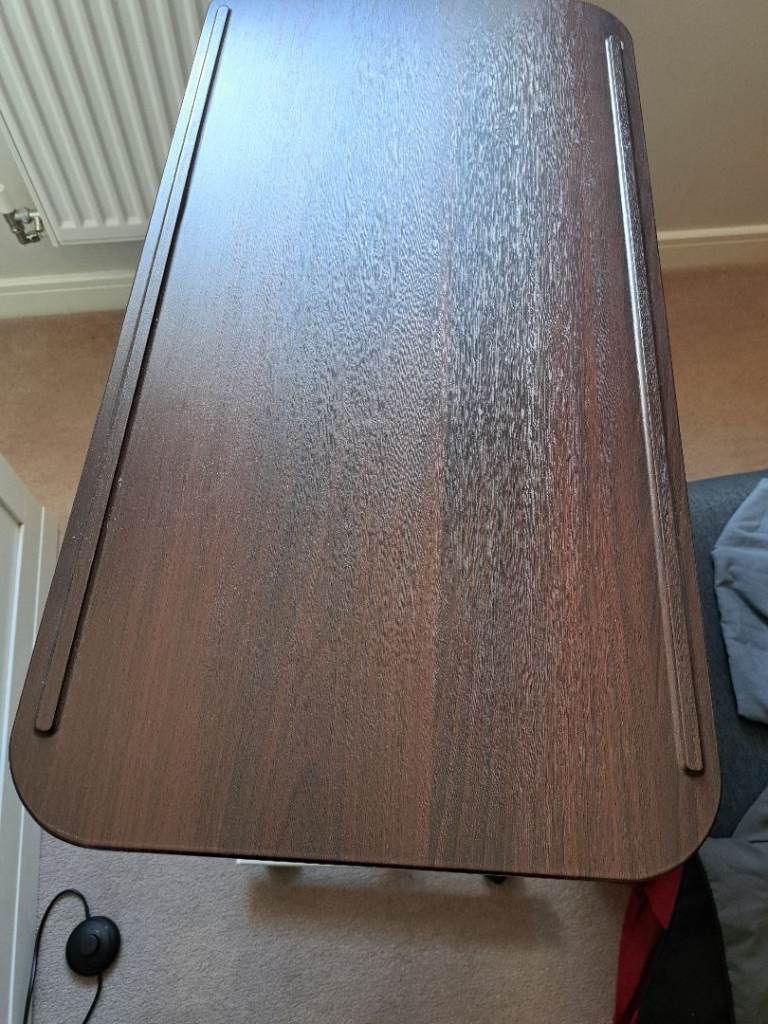 Adjustable overbed / laptop table on wheels