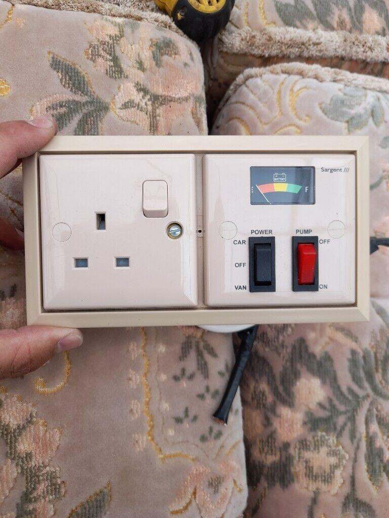 Caravan battery gauge and switch