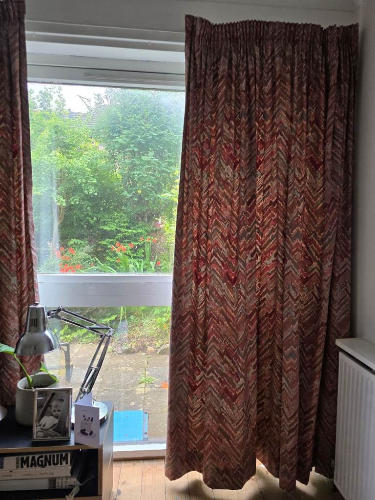 Pair of long patterned curtains
