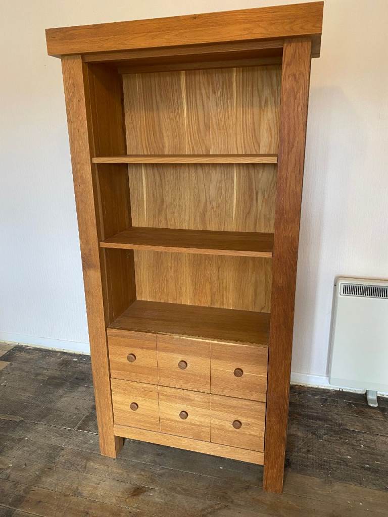 Solid oak bookcase with two drawers excellent condition 