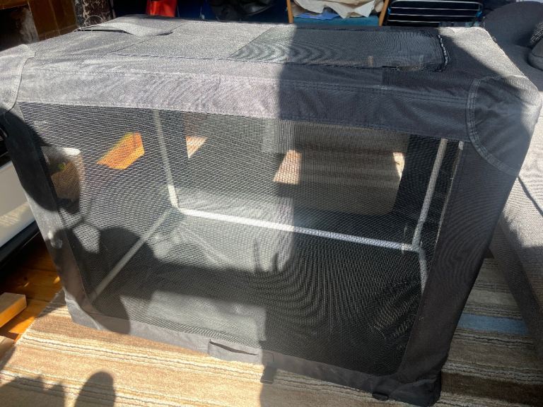 Black folding travel crate