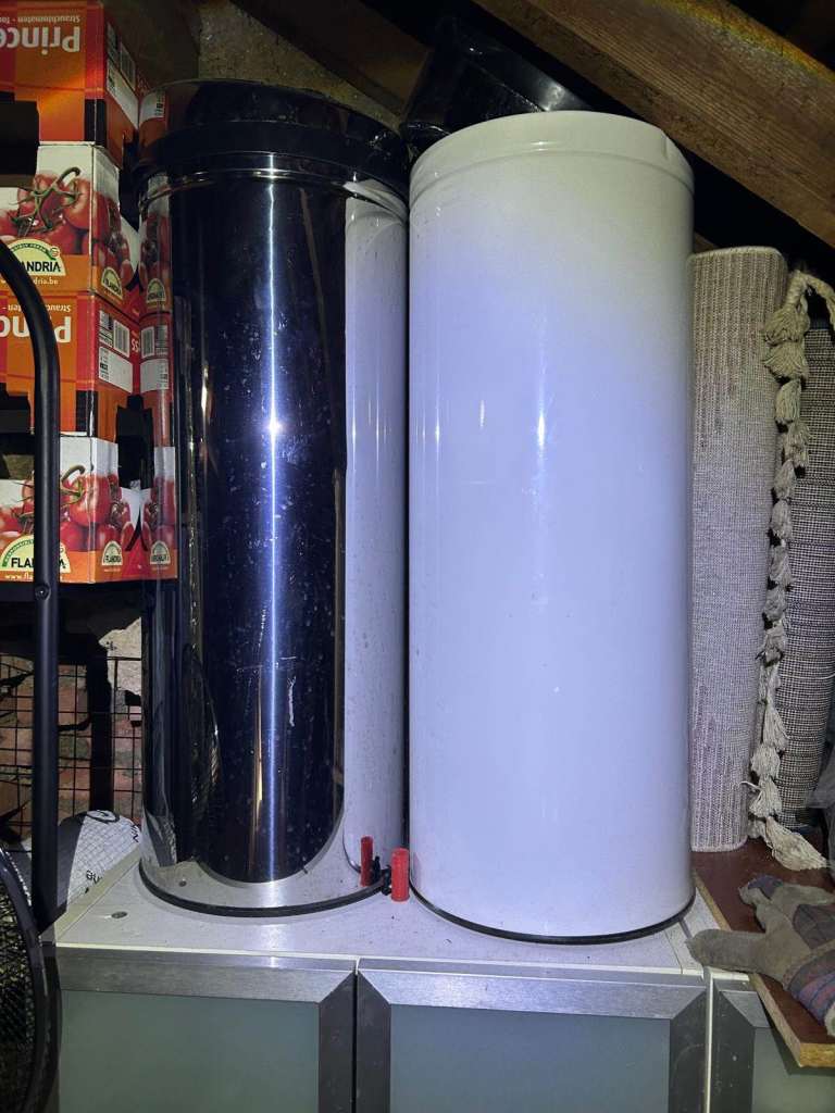 Two stainless steel motion sensor kitchen bins
