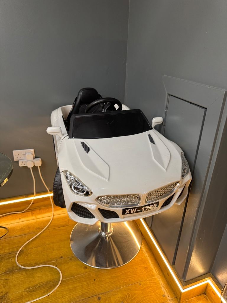 Child's White Car-Shaped Hairdressing Chair