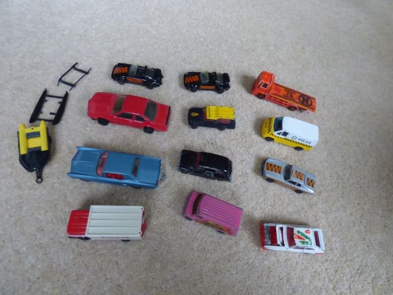 Corgi mixed collection of diecast cars, vans, recovery truck and a boat on a trailer