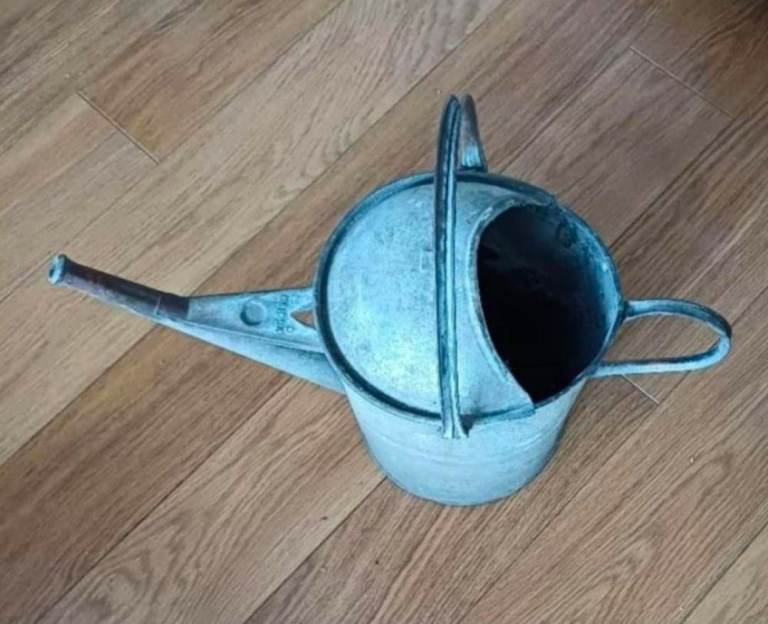 Vintage watering can over 50 year old