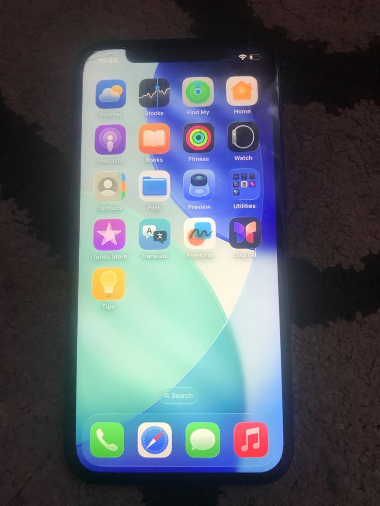 Apple iPhone 12 64gb unlocked fully works housing looks new tiny crack on touch screen at top left