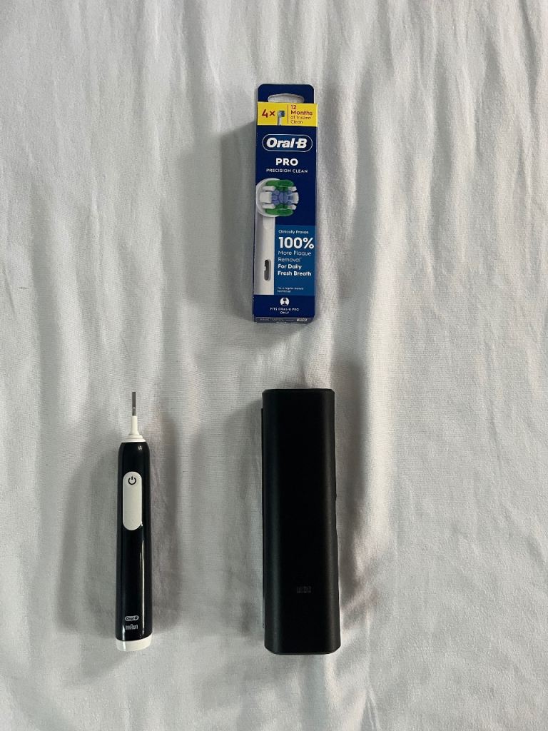 Oral-B PRO Electric Toothbrush with Travel Case + 4 Brand-New Heads