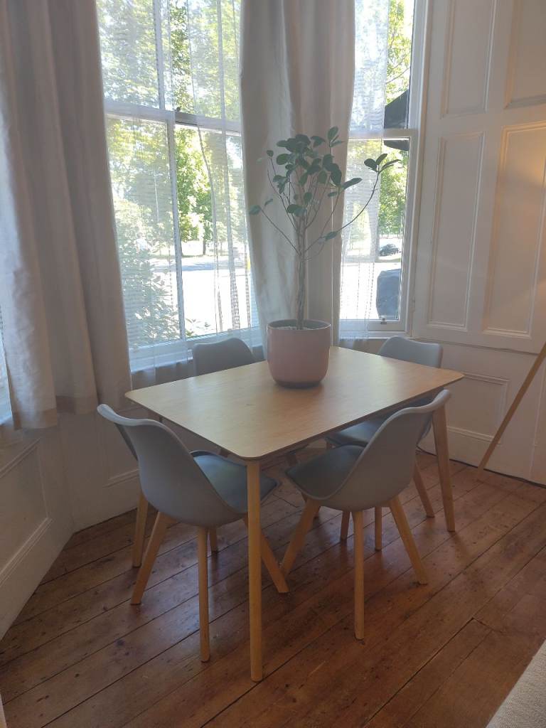 Free dining table and 4 chairs 