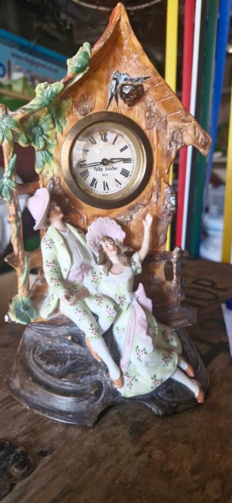 Vintage Toby Baxter Collectible Bisque Mantle Clock with Couple Figurine