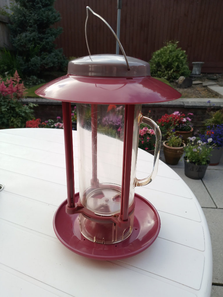 BIRD FEEDERS, 2, - Large seed feeder with removeable jug and a Fatball feeder.