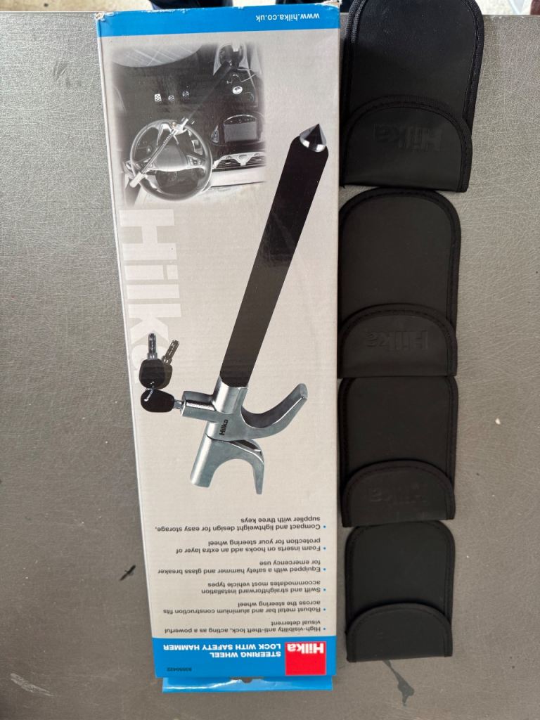 Steering wheel lock and faraday pouches