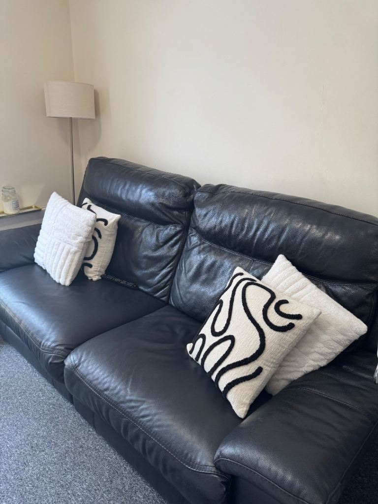 Black Leather Sofa – Two Seater, Good Condition