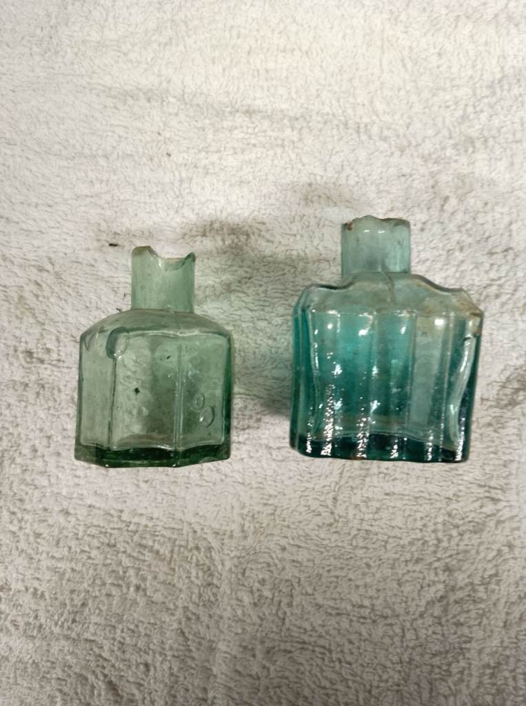 Two old ink wells 