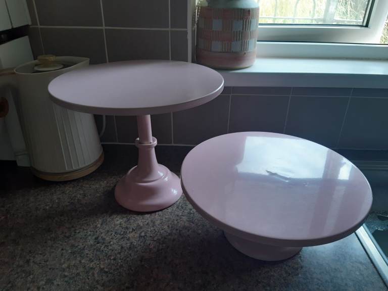 Pair of pink metal cake stands