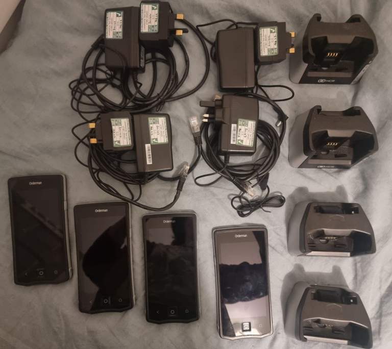 Handheld NCR Orderman 7 with charging bases