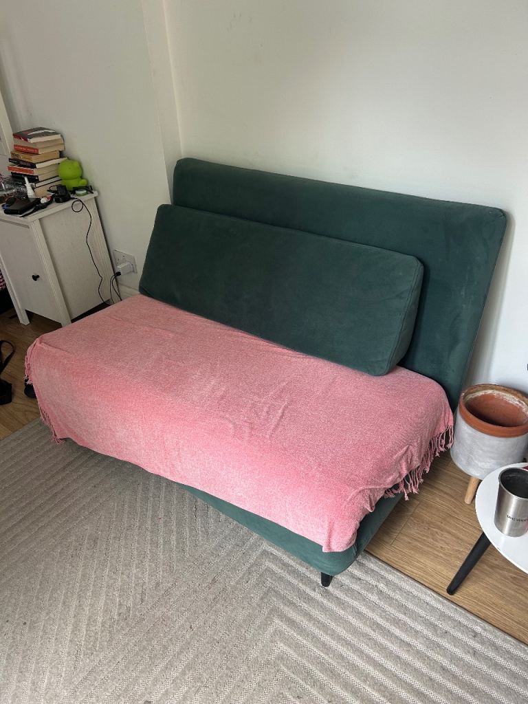 Made green sofa bed