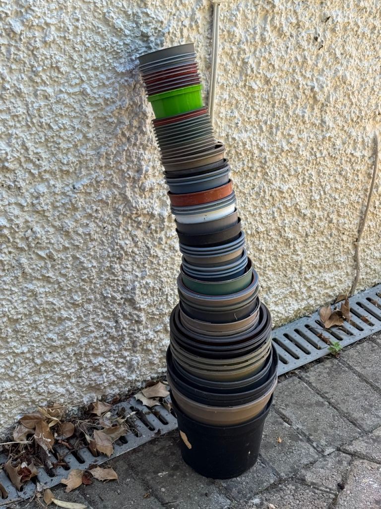 Stack of Various Plastic Plant Pots – Good Condition