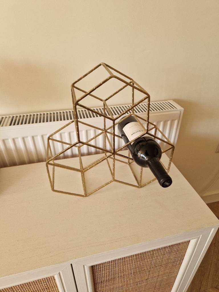 Gold Coloured Metal Oliver Bonas 9-Bottle wine rack