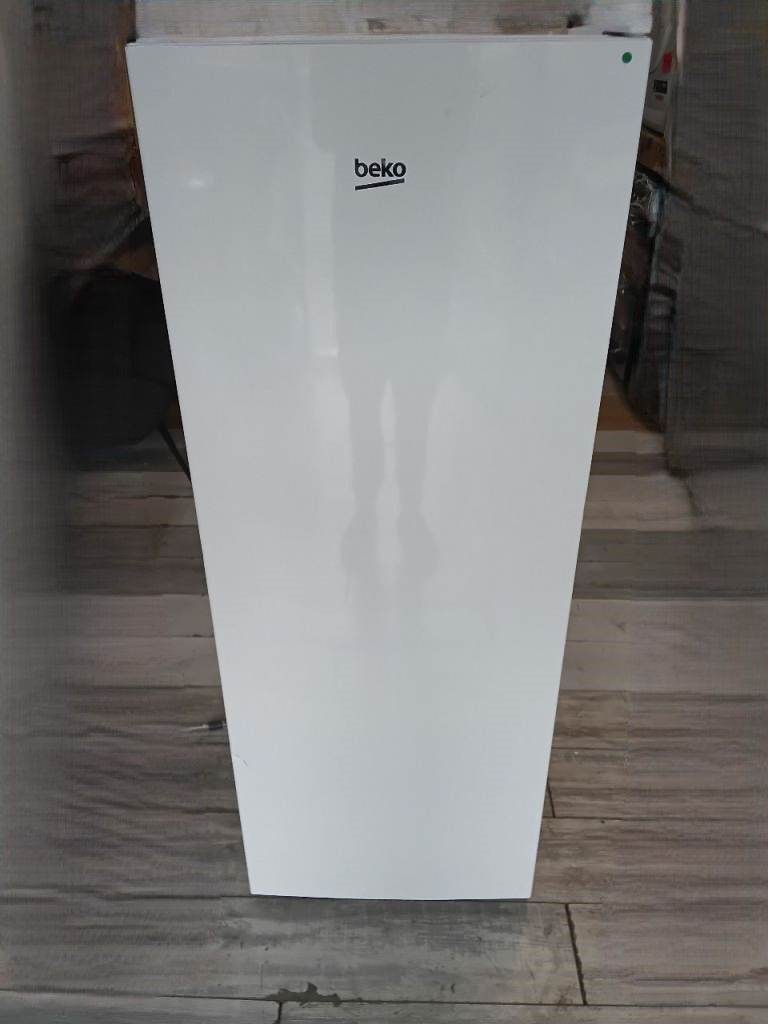 A Beko freestanding fridge in good working order
