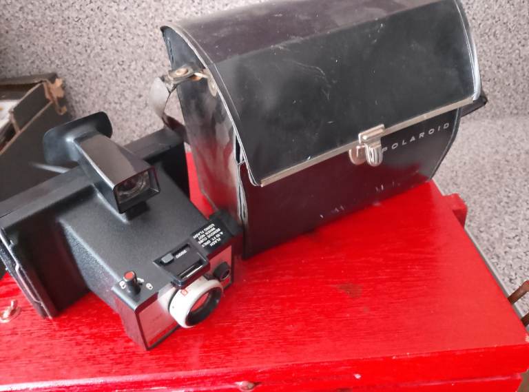 Boxed polairod camera in case 