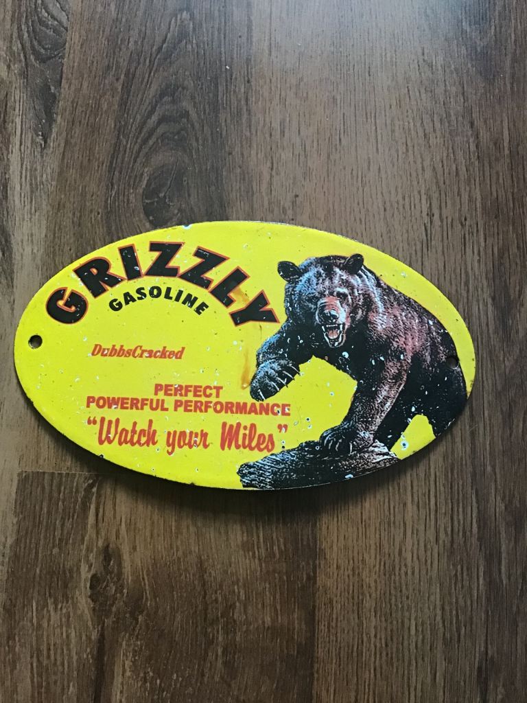 Grizzly enamel gasoline sign 