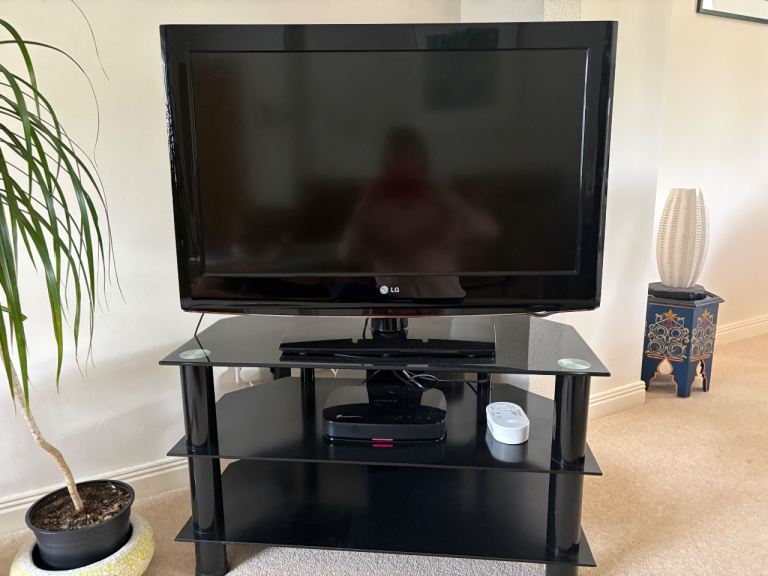 Black Glass TV Stand - Excellent condition 
