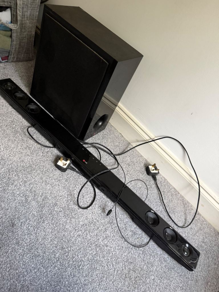 LG Sound Bar and Subwoofer with Remote – Good Condition