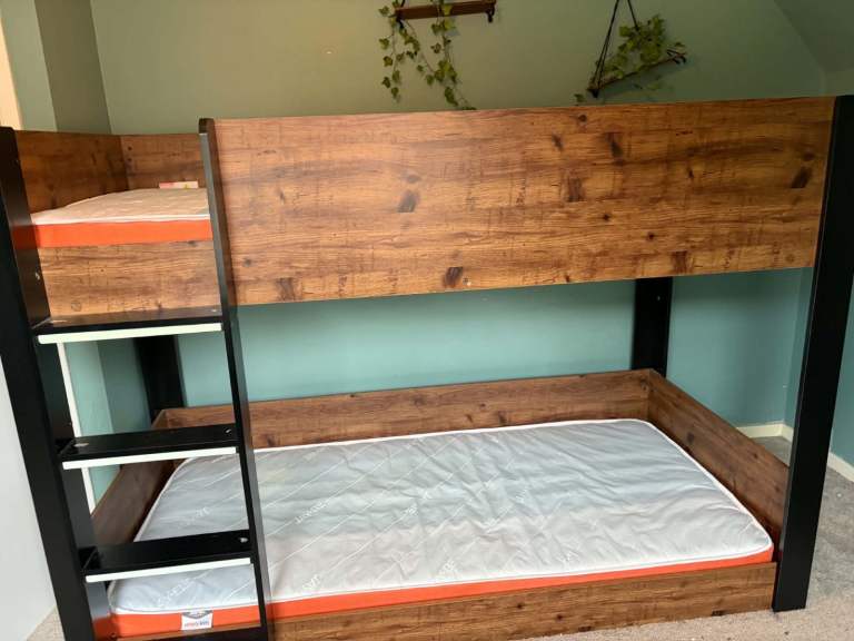 A sturdy set of wooden bunk beds
