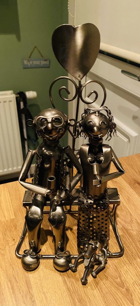 Wine bottle holder - metal artwork