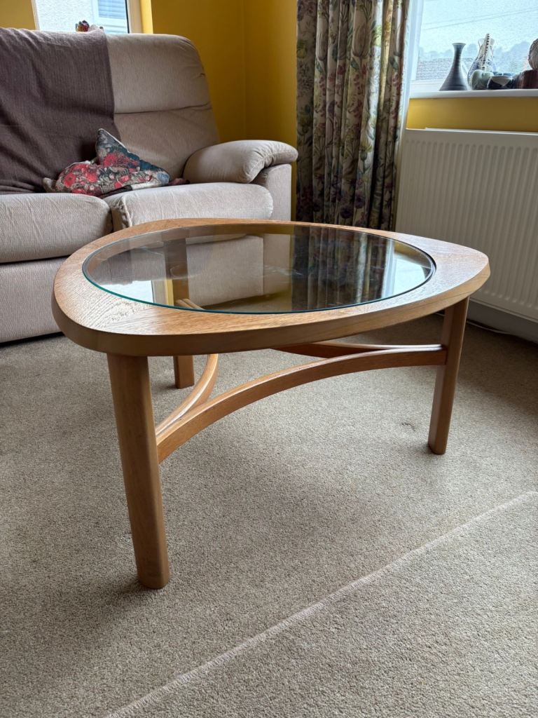 Nathan mid century triangular teak glass top coffee table.  Widest 75.5cms height 43.5cms