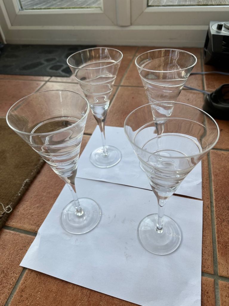 Set of 4 tall martini or cocktail glasses.