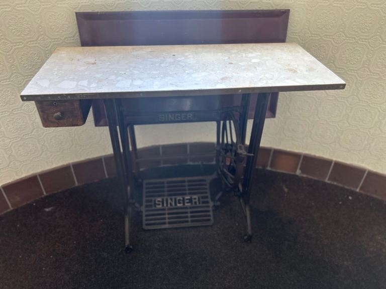 Sewing machine table