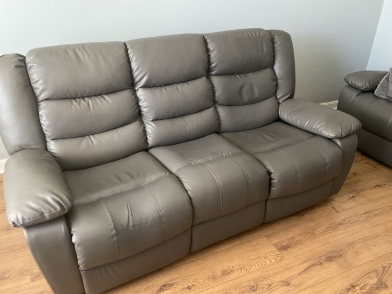 Three seater reclining sofa
