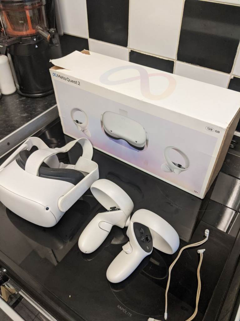 Meta Quest 2 VR Headset with Controllers – Good Condition