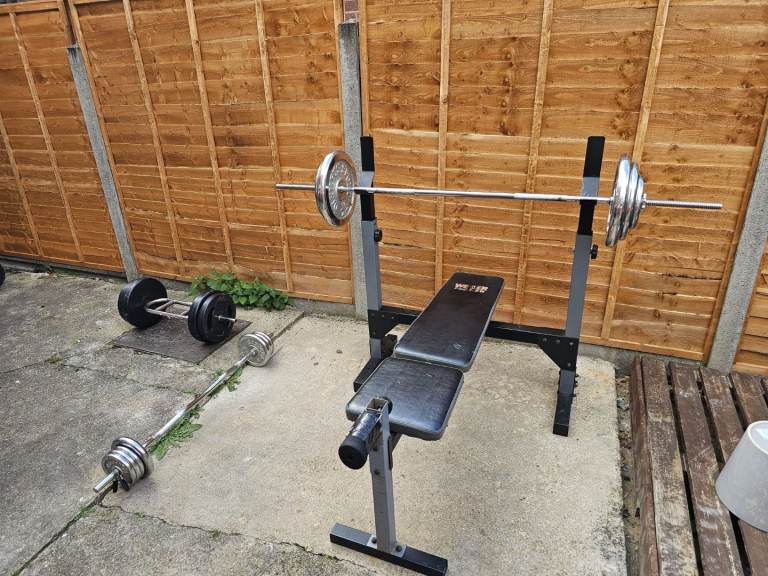 Bench with 100kg weights