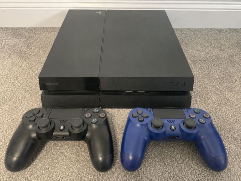Sony PS4 Console with Two Controllers - Perfect condition.