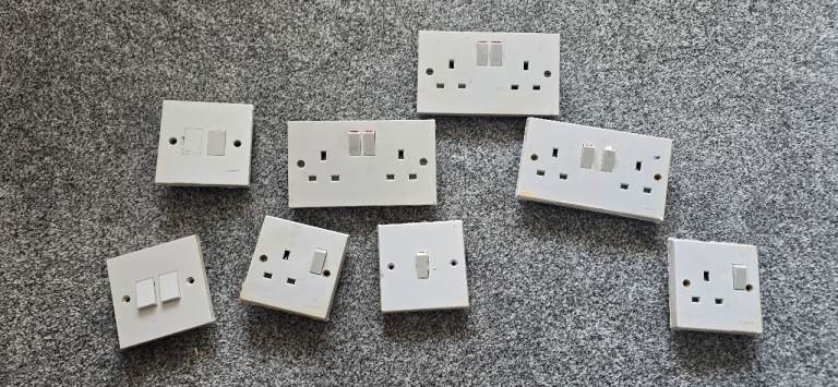 Job lot white plug sockets and switches 