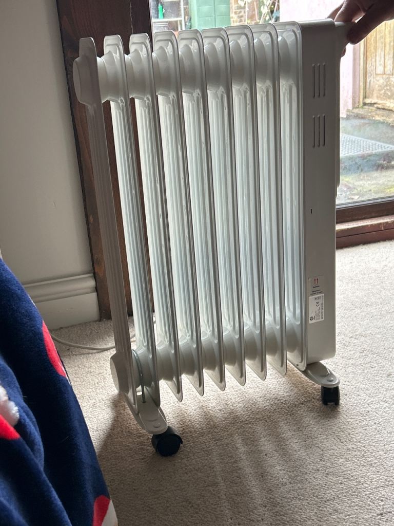 Electric oil filled radiator on wheels