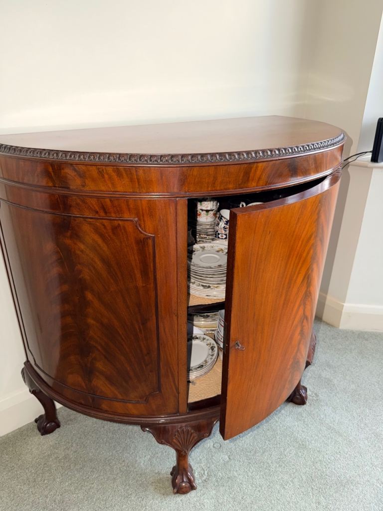 demi-lune sideboard or half-moon cabinet.