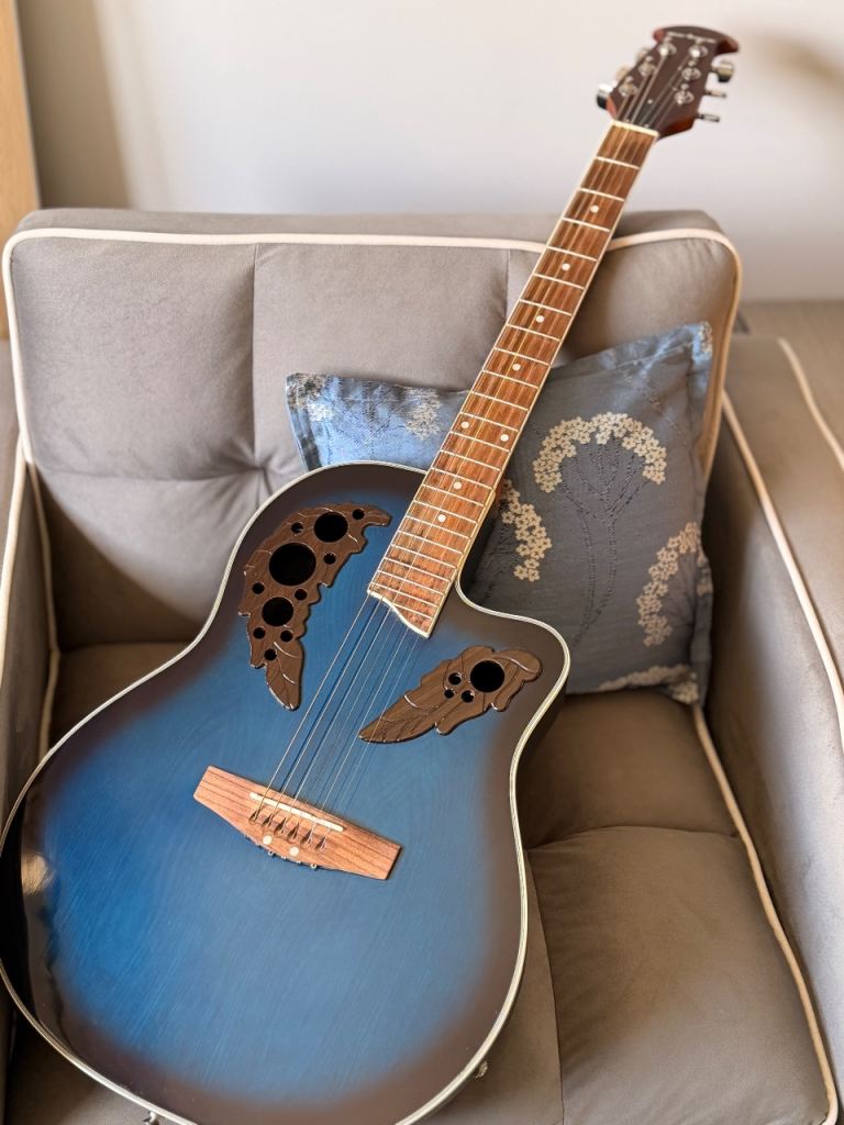 Stunning blue cut-off Ovation imitation semi-acoustic guitar