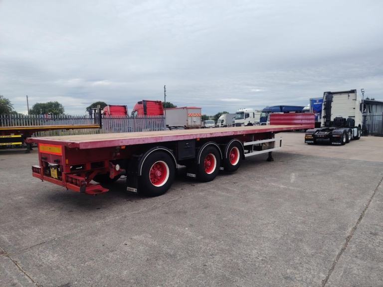 Flat trailer 13 meter long rear steering axle Front lift BPW axles drum new mot